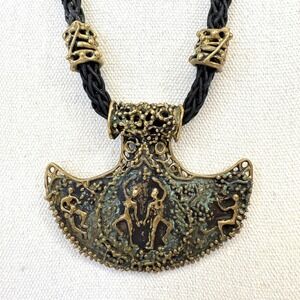 Vintage Style Hammer Pendant Necklace Bronze Tone Tribal Figures Braided Cord